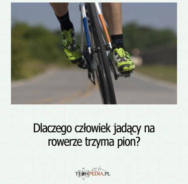 Dlaczego człowiek jadący na rowerze trzyma pion?